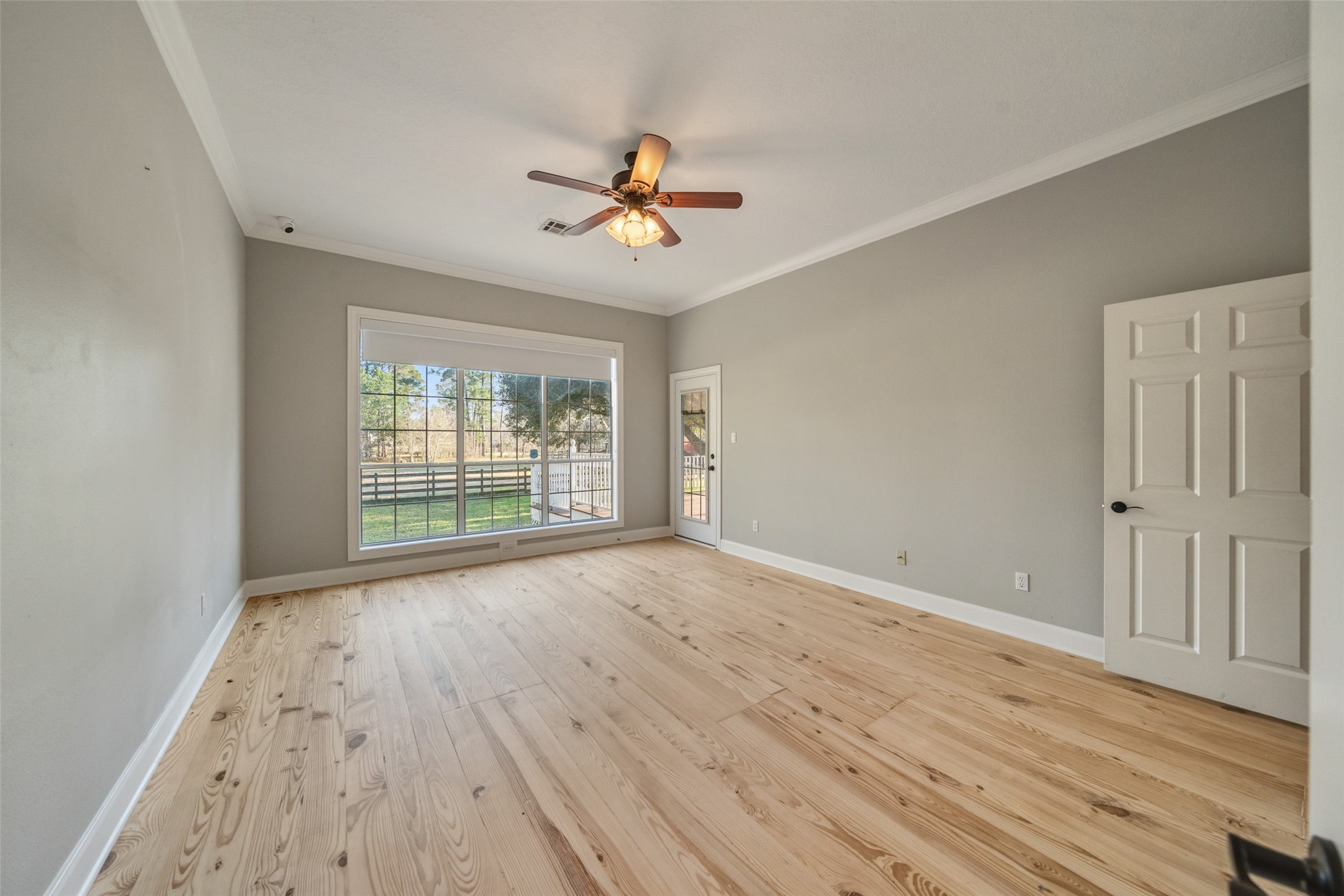 36003 Post Oak Circle Magnolia, TX 77355 - Photo 20 of 50 a view of room with window ceiling fan and hardwood floor