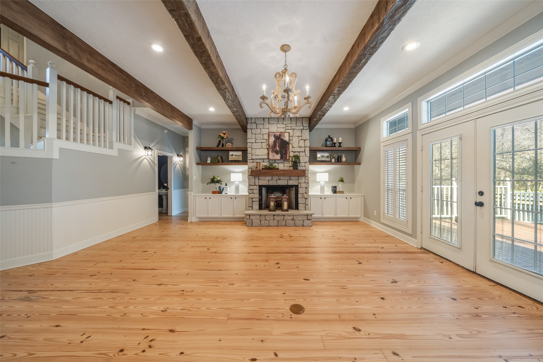 36003 Post Oak Circle Magnolia, TX 77355 - Photo 2 of 50 a view of a livingroom with a kitchen and a window