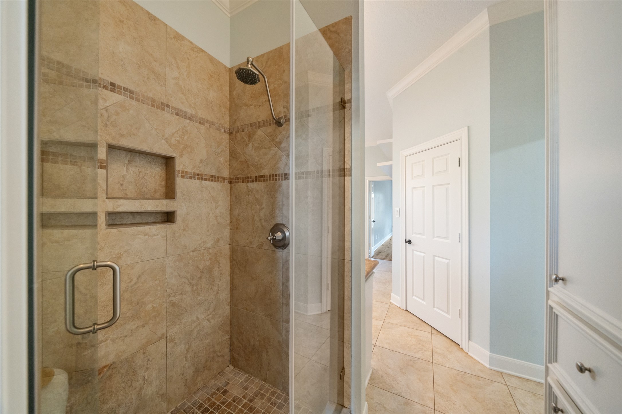 36003 Post Oak Circle Magnolia, TX 77355 - Photo 23 of 50 a bathroom with a glass shower door