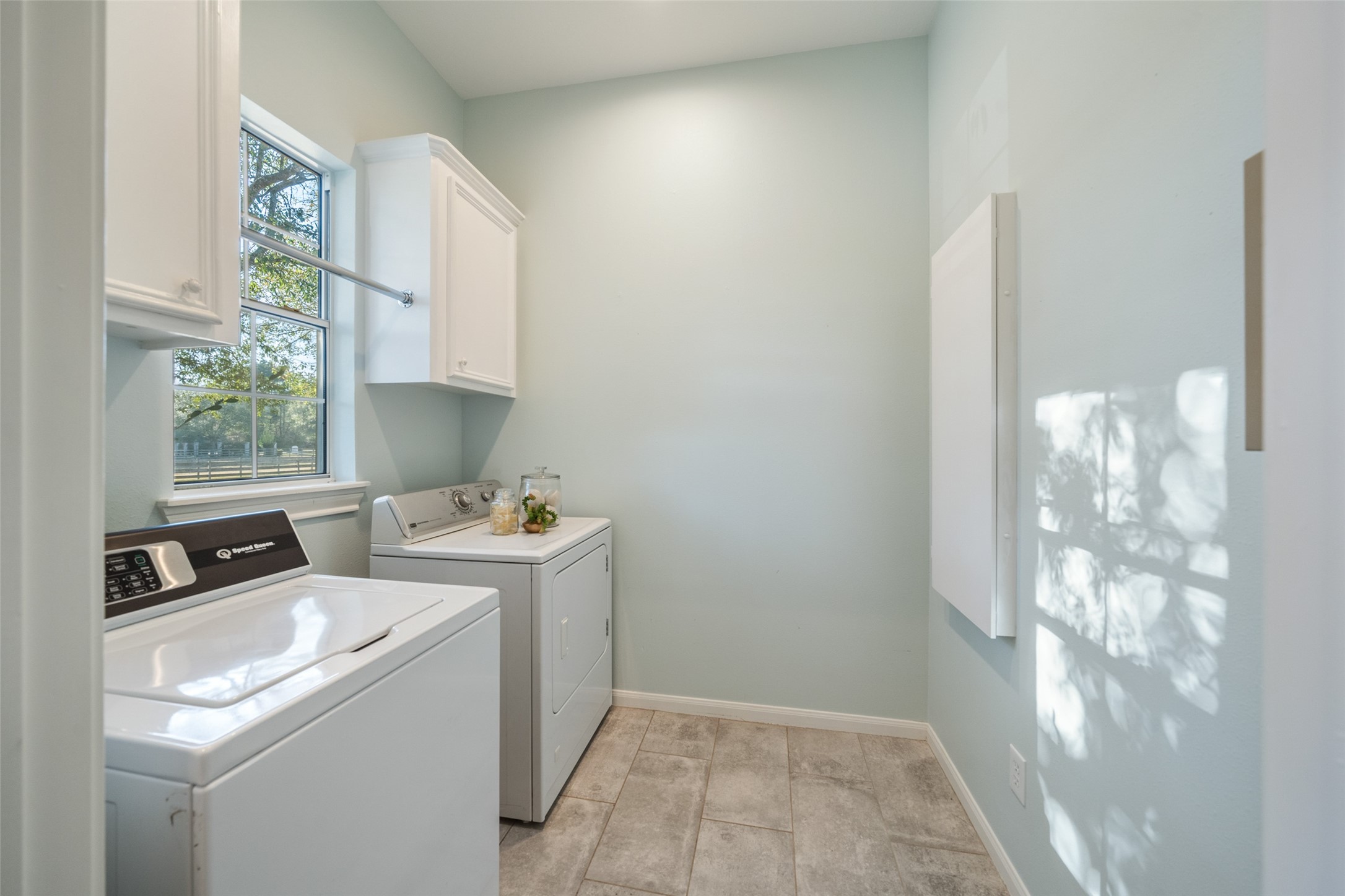 36003 Post Oak Circle Magnolia, TX 77355 - Photo 31 of 50 a utility room with dryer and washer