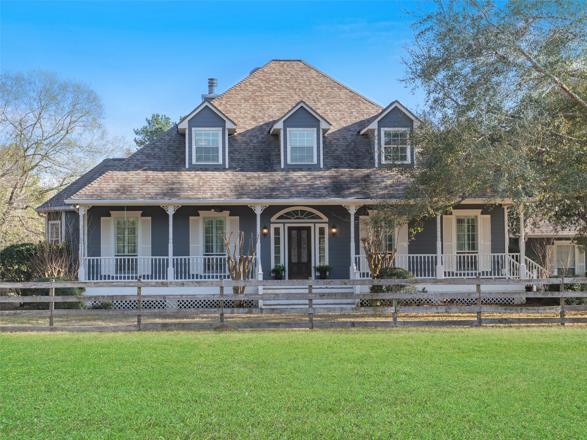 36003 Post Oak Circle Magnolia, TX 77355 - Photo 47 of 50 a front view of a house with swimming pool