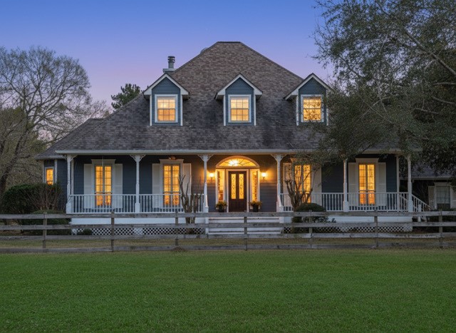 36003 Post Oak Circle Magnolia, TX 77355 - Photo 5 of 50 a front view of multiple houses with yard