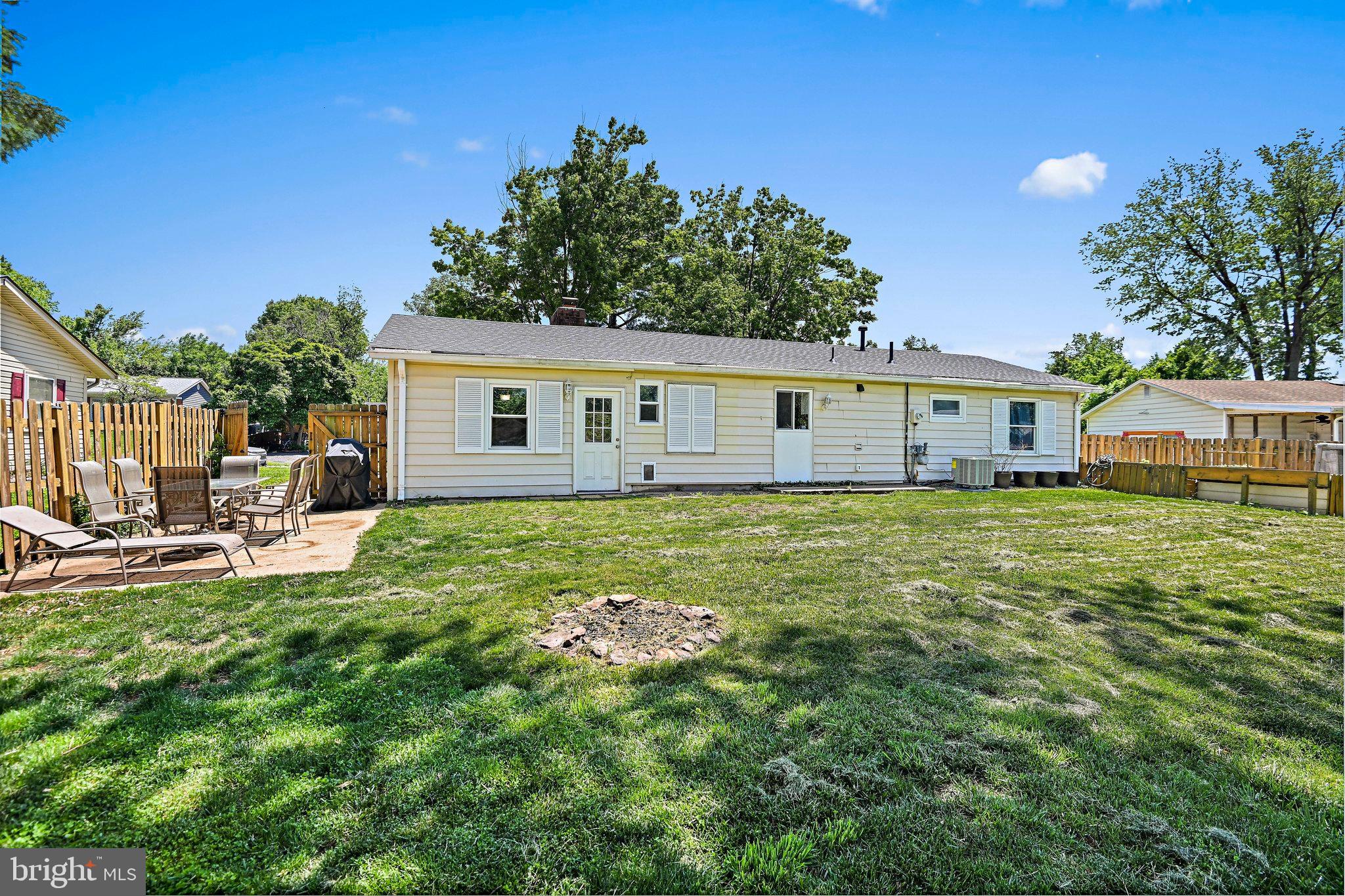 103 North Cypress Road Sterling, VA 20164 - Photo 29 of 31 Backyard with privacy fence and patio