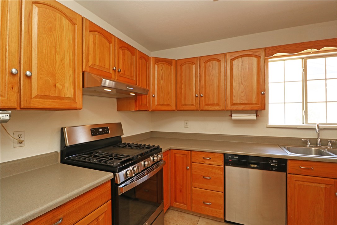 721 North Milford Road Orange, CA 92867 - Photo 15 of 38 Kitchen with plenty of cabinetry and stainless steel appliances 3.