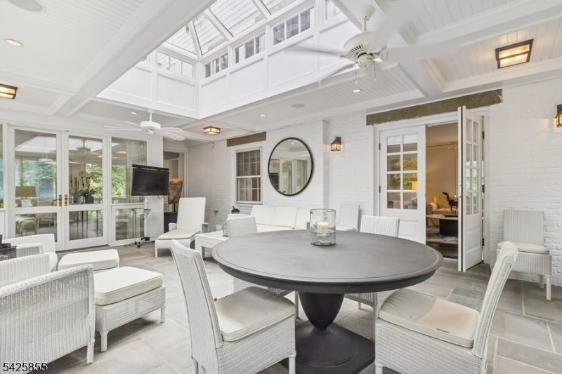 21 Hardwell Road Short Hills, NJ 07078 - Photo 31 of 50 a dining room with furniture and a large window