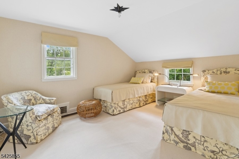 21 Hardwell Road Short Hills, NJ 07078 - Photo 33 of 50 a bedroom with two beds and a window