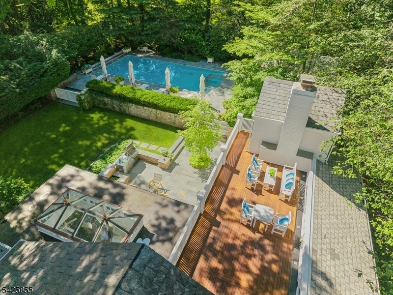 21 Hardwell Road Short Hills, NJ 07078 - Photo 49 of 50 a front view of a house with a yard