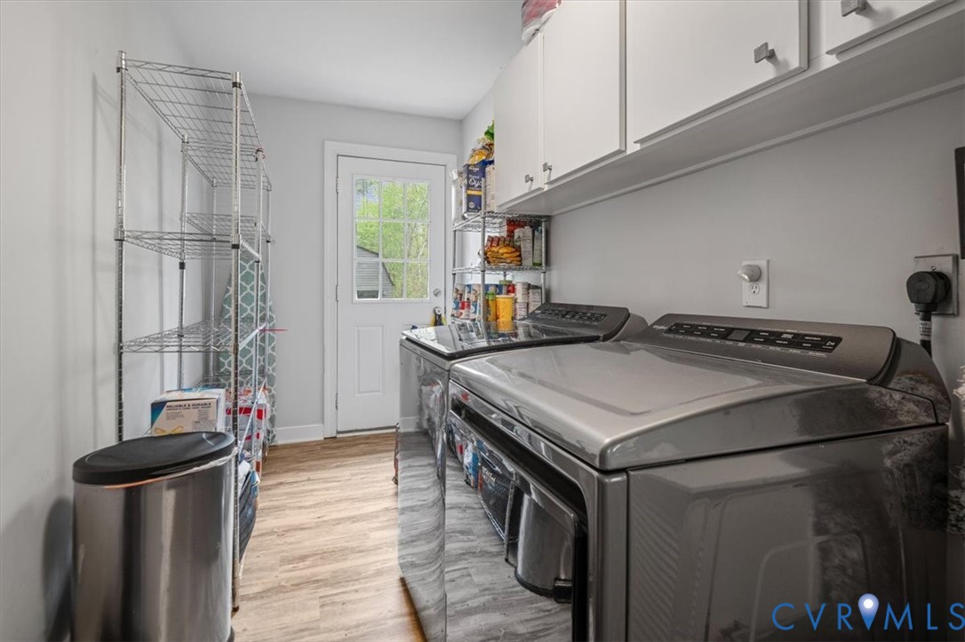 9820 Beaver Bridge Road Chesterfield, VA 23838 - Photo 22 of 54 Laundry area featuring a rear exterior door, white