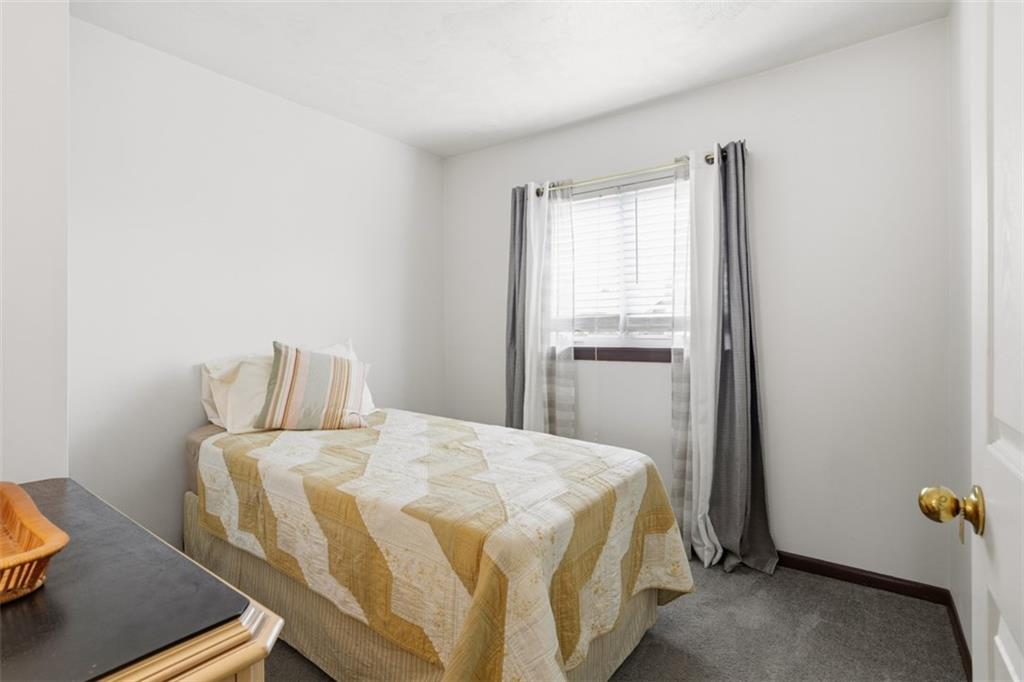 206 Third Street Pittsburgh, PA 15225 - Photo 19 of 25 a bedroom with a bed and a window