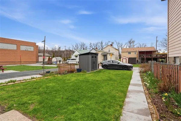 a view of a house with a back yard