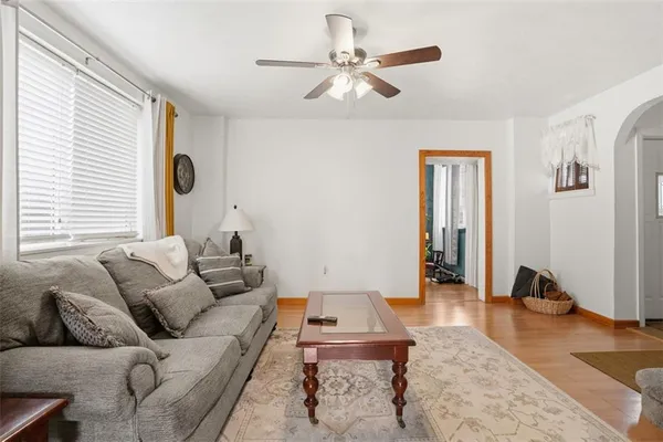 a living room with furniture and a window