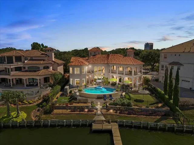 a view of a lake with a building in the background