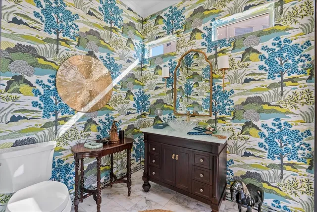 a bathroom with a sink and mirror