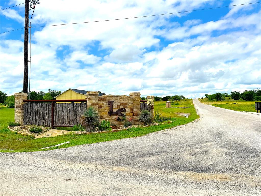 1020 Goodnight Trail Perrin, TX 76486 - Photo 3 of 14 a view of a terrace with a big yard