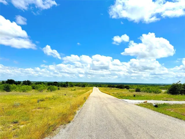 a view of an swimming pool and an outdoor seating