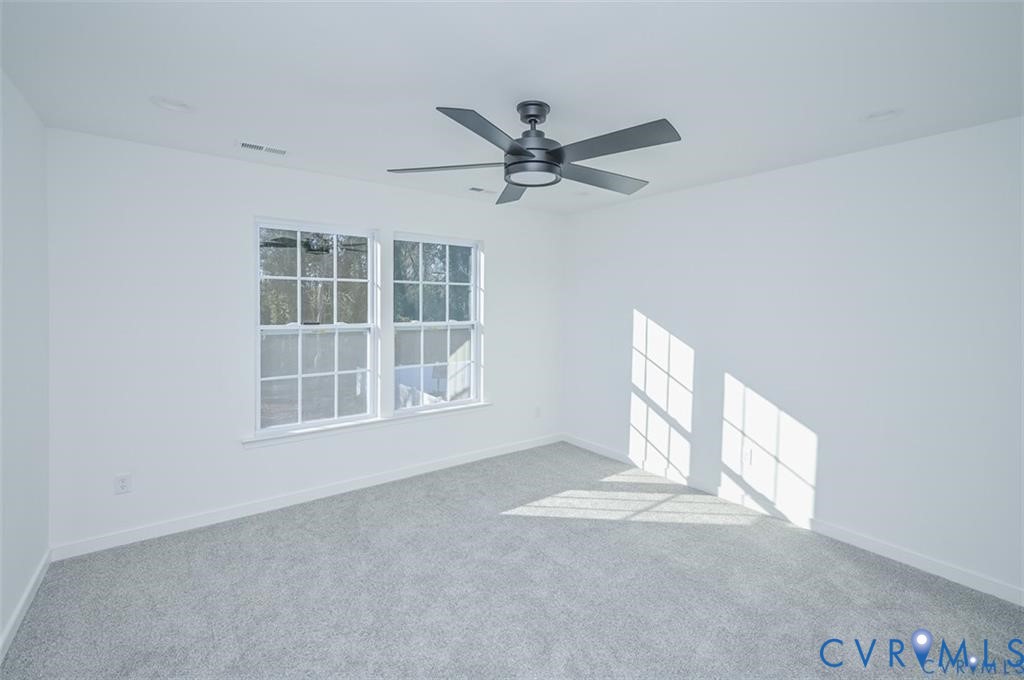352 Ogden Street West Point, VA 23181 - Photo 15 of 29 an empty room with windows and entryway