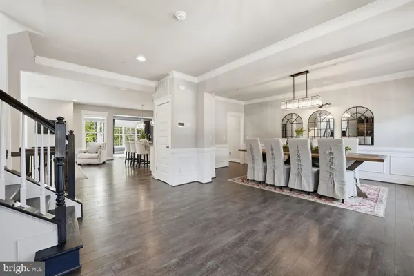 a spacious bedroom with a bed and a couch