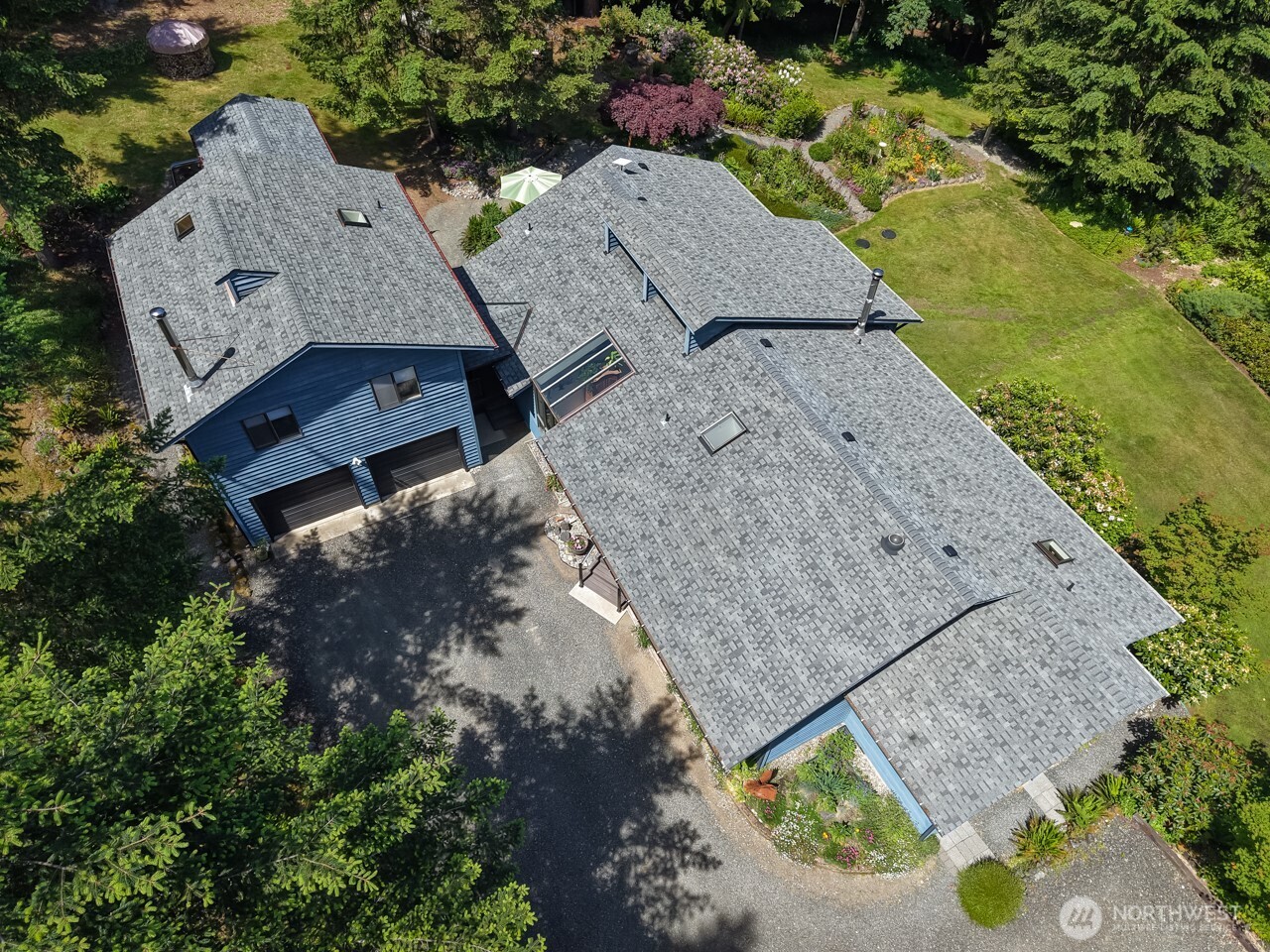 492 Walkabout Way Port Angeles, WA 98363 - Photo 11 of 40 an aerial view of a house with a yard swimming pool and outdoor seating