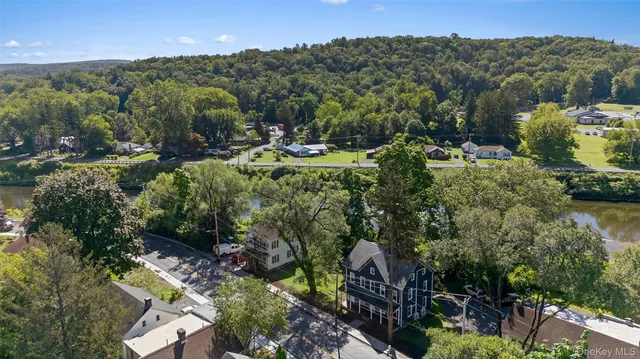 a view of a garden with a building in the background