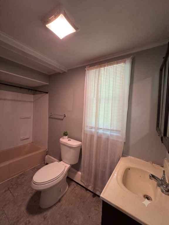 27 High Street Sturbridge, MA 01518 - Photo 6 of 17 a white toilet sitting next to a bathroom sink
