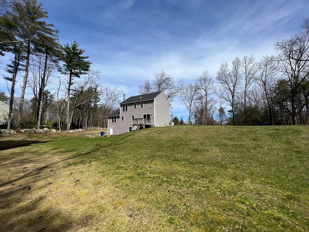 78 Bayberry Hill Road Townsend, MA 01474 - Photo 21 of 26 a view of a house with a yard