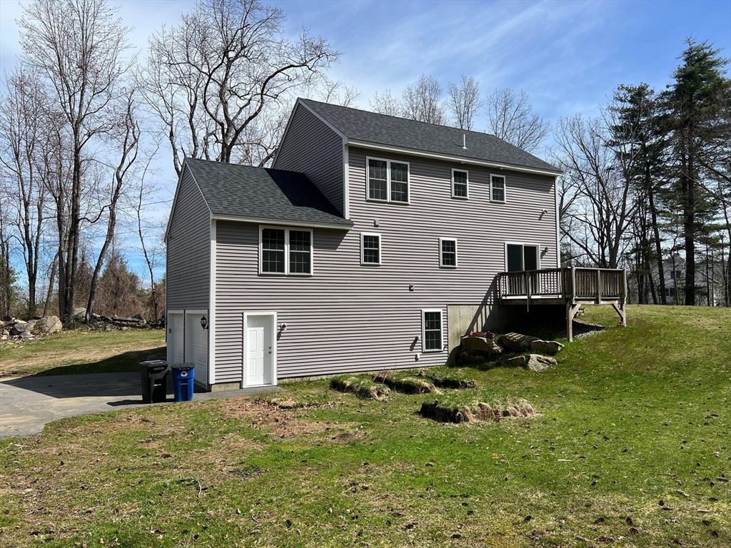 78 Bayberry Hill Road Townsend, MA 01474 - Photo 25 of 26 a view of a house with a yard