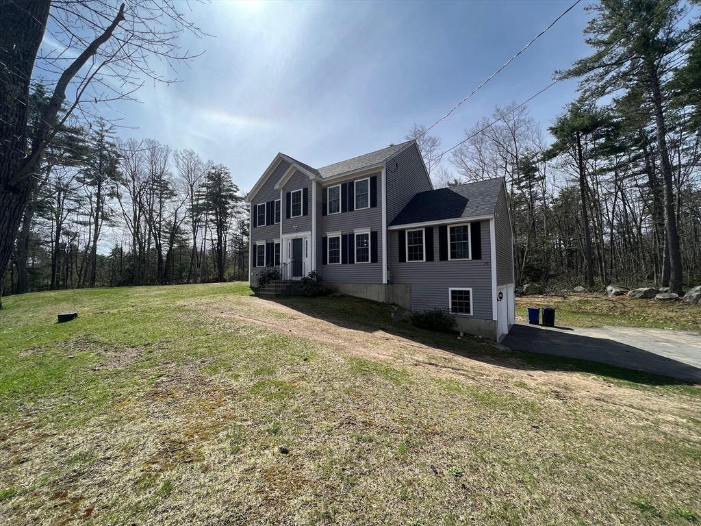 78 Bayberry Hill Road Townsend, MA 01474 - Photo 26 of 26 a front view of a house with a yard