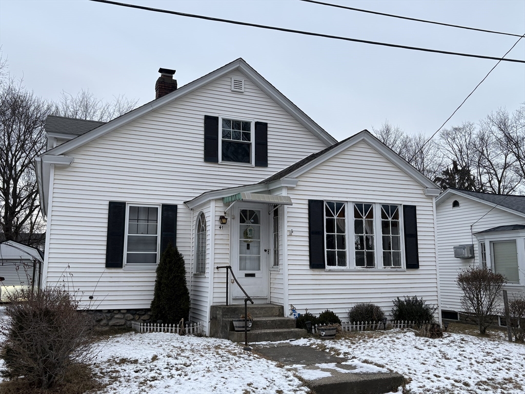 41 Amesbury Street Worcester, MA 01605 - Photo 1 of 17 a front view of a house with a balcony
