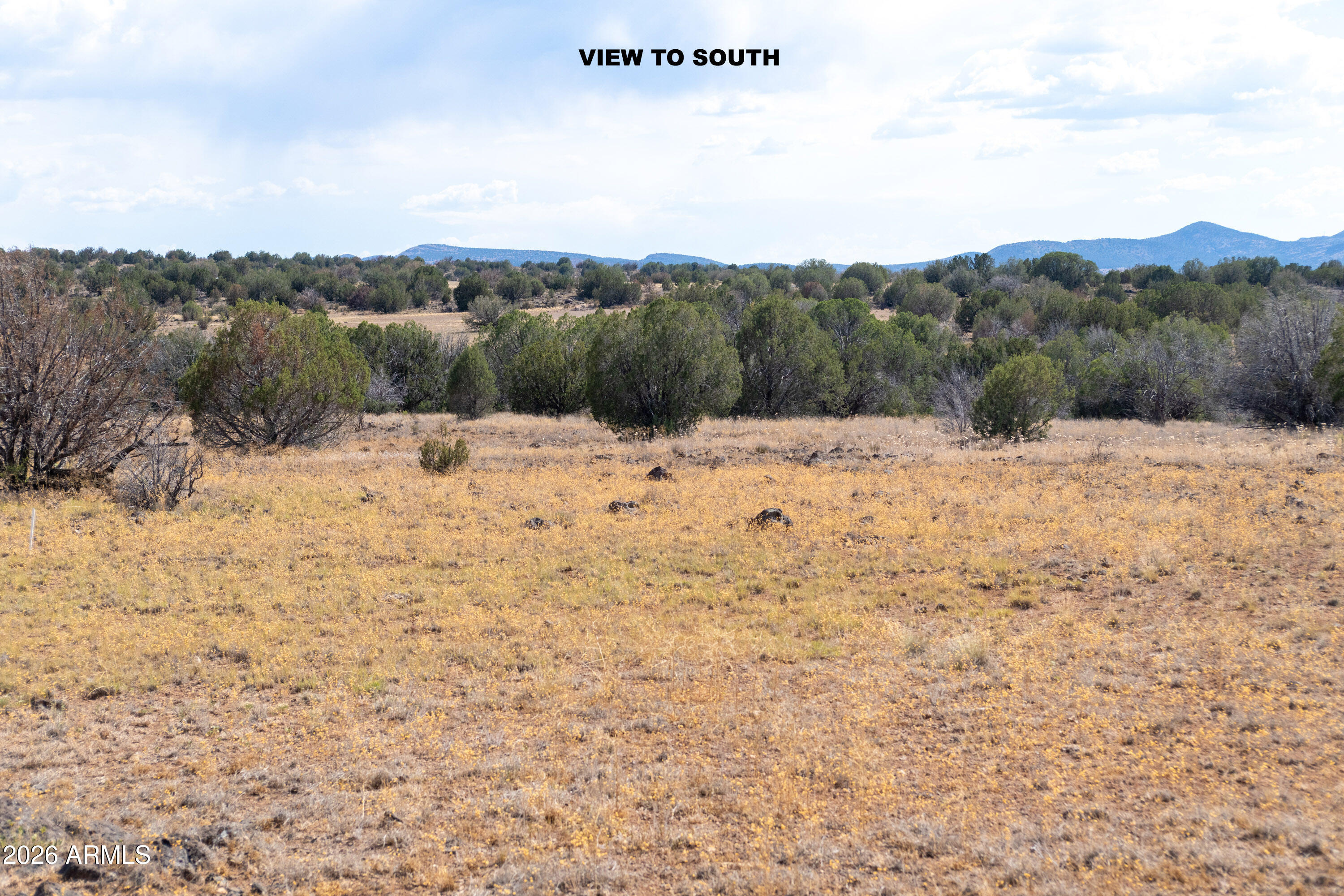 2.13-acres North Headwaters Road, Unit 7 Paulden, AZ 86334 - Photo 10 of 17 a view of a lake with a mountain