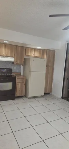 a utility room with washer and dryer