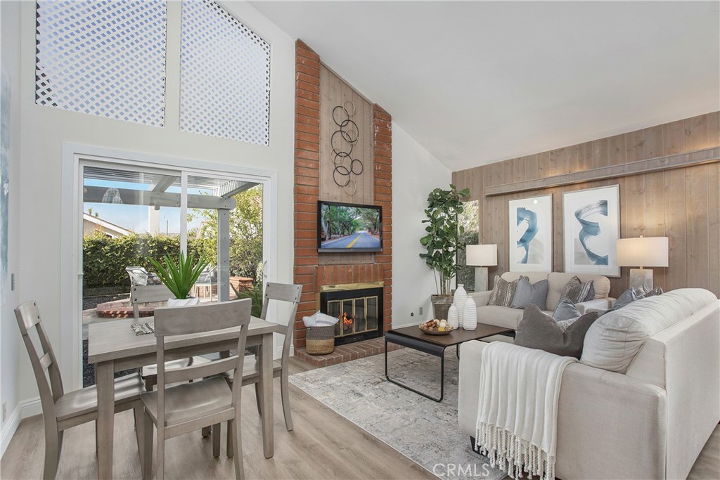 11 Ensueno Irvine, CA 92620 - Photo 12 of 36 a living room with furniture and a large window