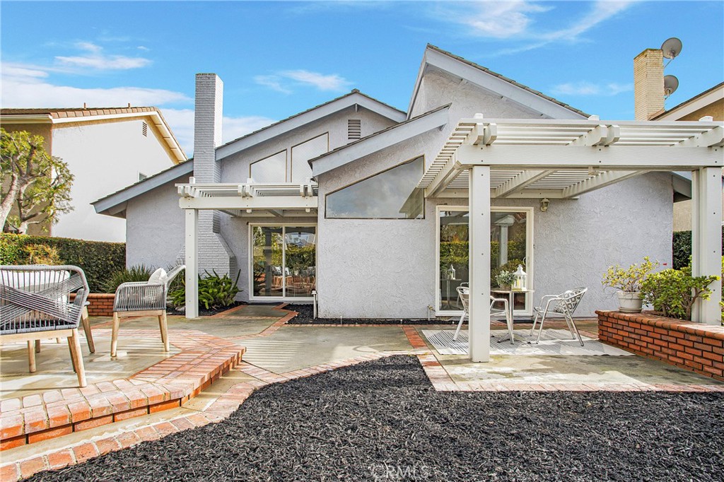 11 Ensueno Irvine, CA 92620 - Photo 29 of 36 a view of a house with patio