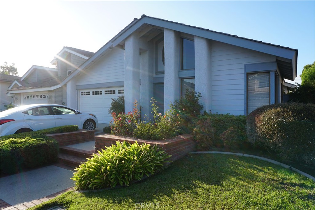 11 Ensueno Irvine, CA 92620 - Photo 36 of 36 a front view of a house with garden