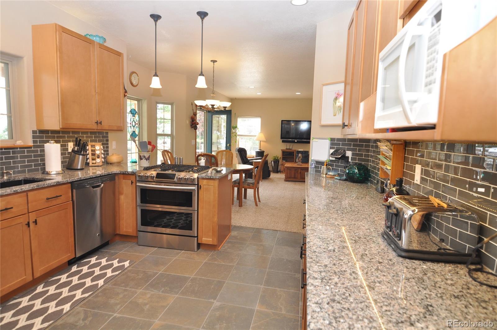 13272 Riley Peak Road Conifer, CO 80433 - Photo 9 of 32 Gallery Image 9