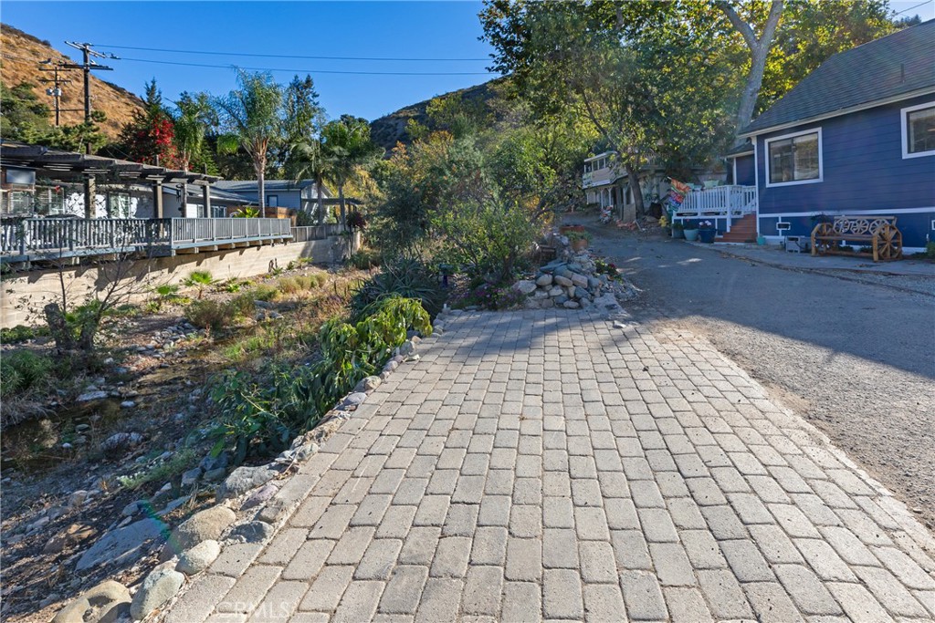 28344 Water Way Silverado, CA 92676 - Photo 12 of 34 a view of a pathway with a yard