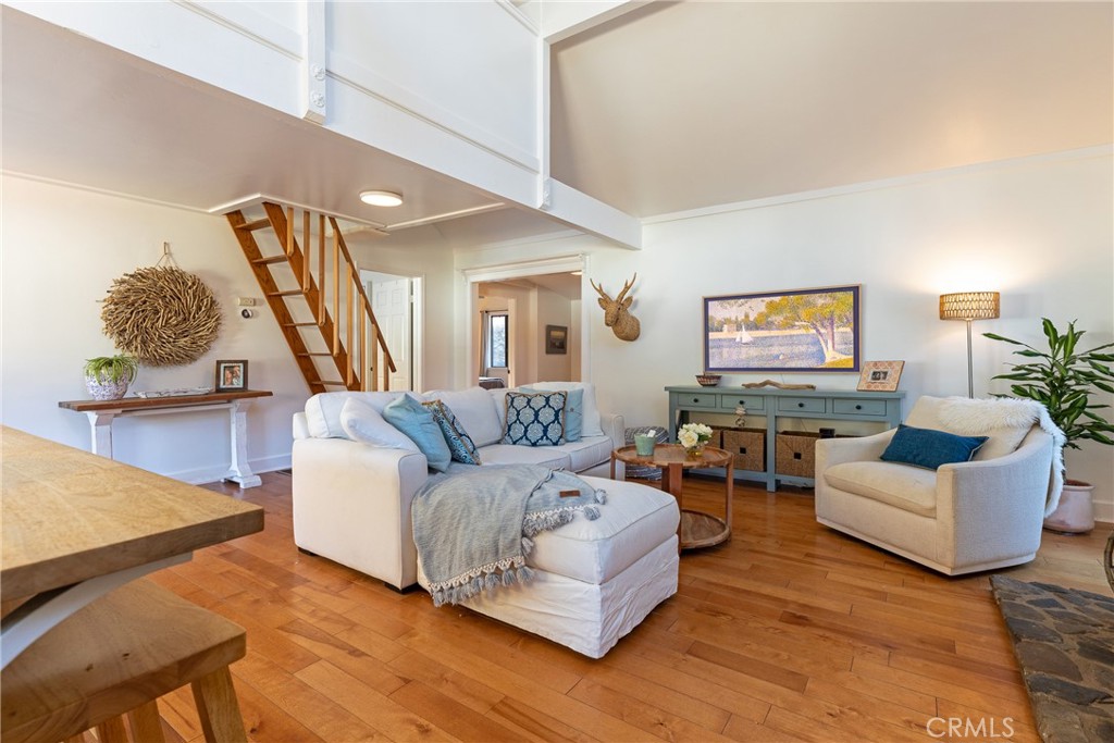 28344 Water Way Silverado, CA 92676 - Photo 15 of 34 a living room with furniture and a wooden floor