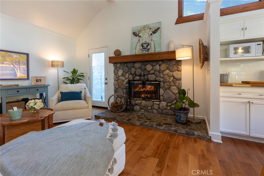 28344 Water Way Silverado, CA 92676 - Photo 16 of 34 a living room with furniture and a fireplace
