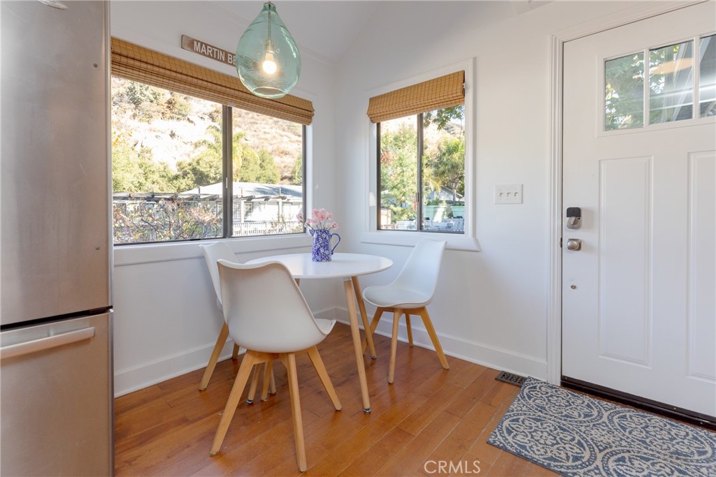 28344 Water Way Silverado, CA 92676 - Photo 17 of 34 a view of a dining room with furniture window and wooden floor