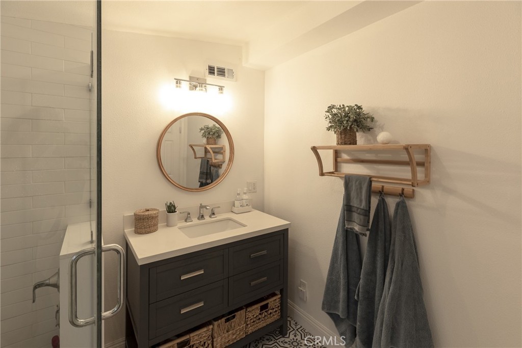 28344 Water Way Silverado, CA 92676 - Photo 23 of 34 a bathroom with a sink and a mirror