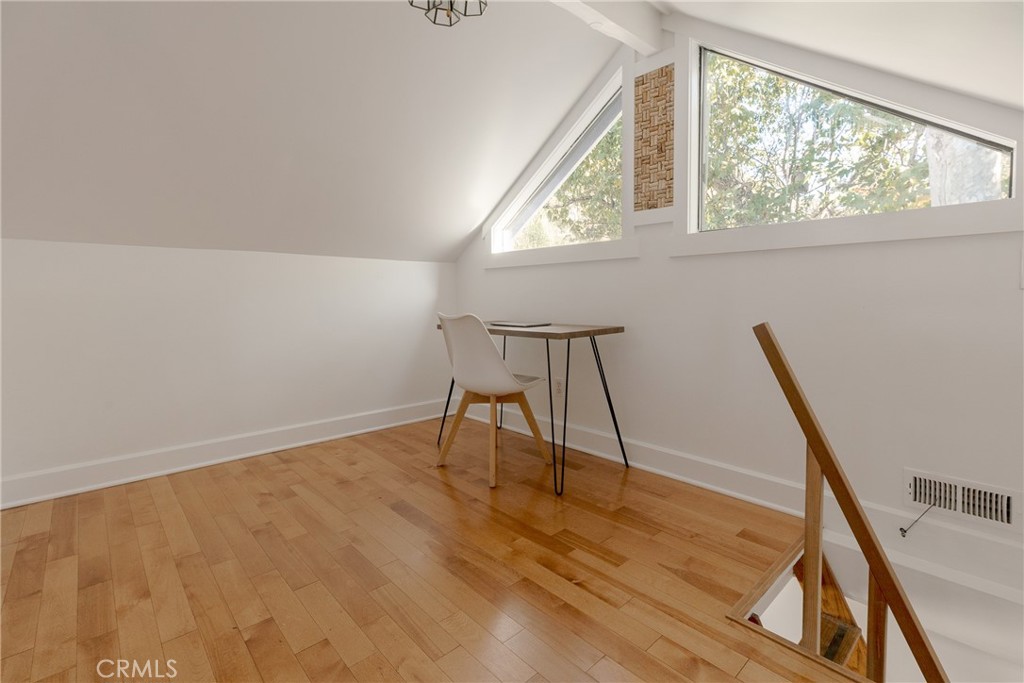 28344 Water Way Silverado, CA 92676 - Photo 24 of 34 a view of an empty room with wooden floor and a window
