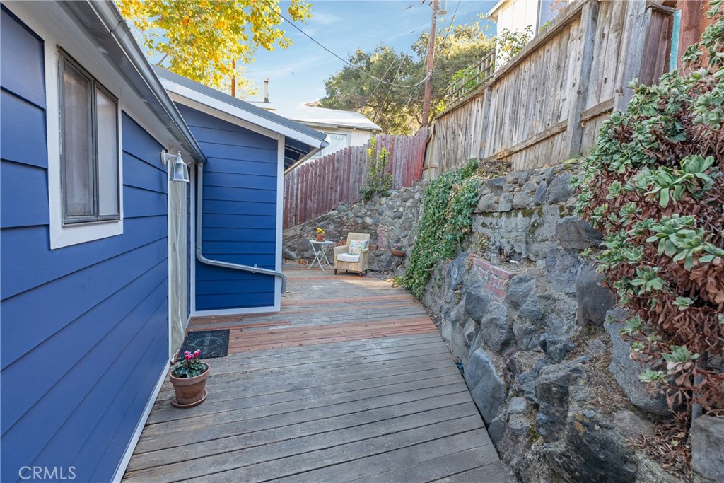 28344 Water Way Silverado, CA 92676 - Photo 26 of 34 a view of a pathway with a wooden fence