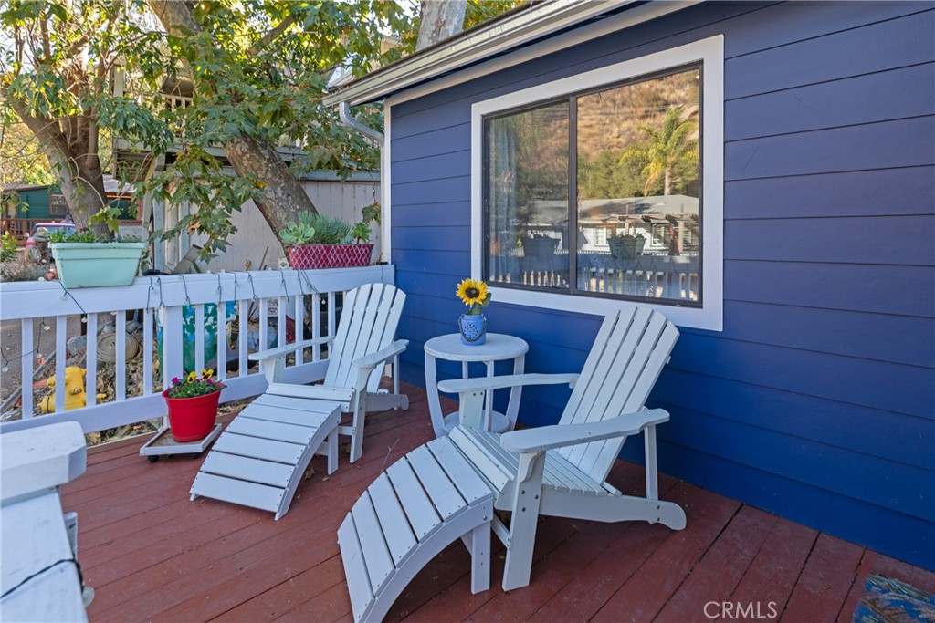 28344 Water Way Silverado, CA 92676 - Photo 10 of 34 a view of a chairs and table on the deck