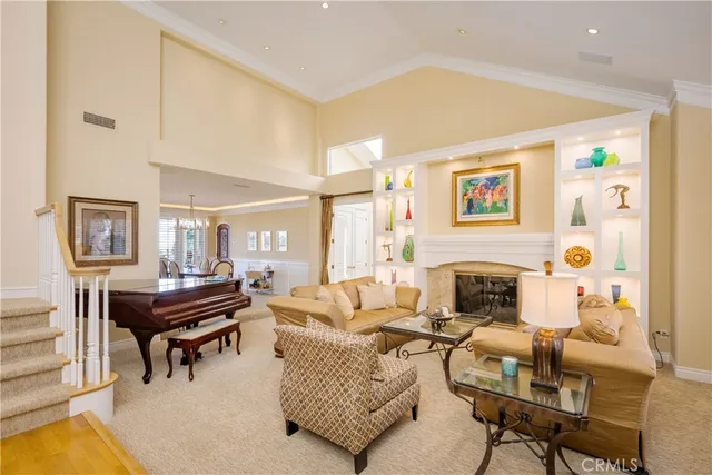 a living room with furniture rug and window
