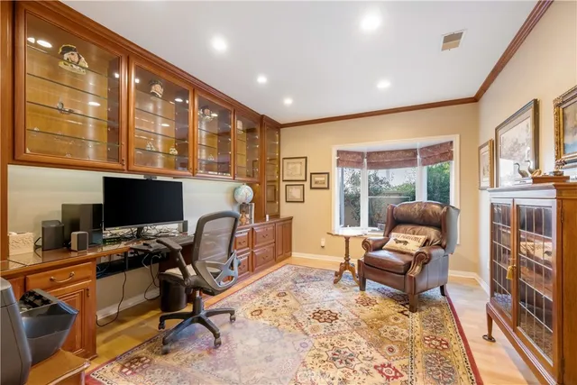 a bathroom with a sink a mirror and a window