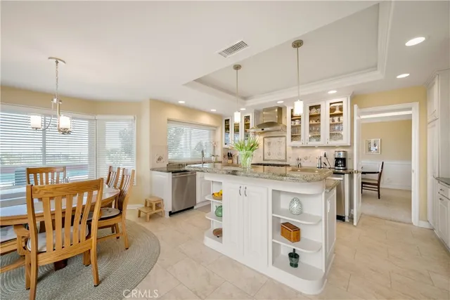 a kitchen with counter top space and appliances