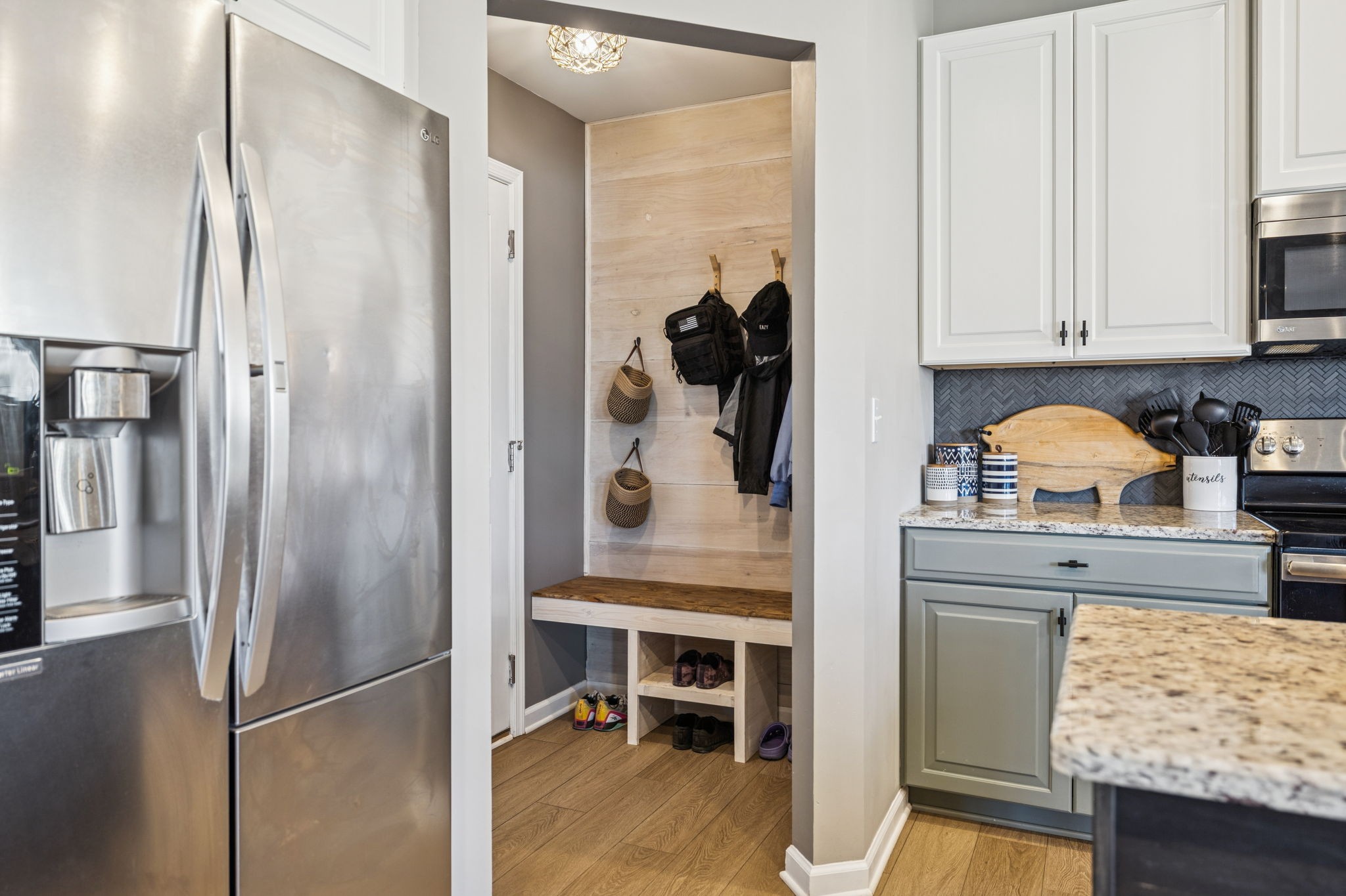 140 Hackney Lane Gallatin, TN 37066 - Photo 29 of 66 a kitchen with stainless steel appliances granite countertop a refrigerator and a stove top oven