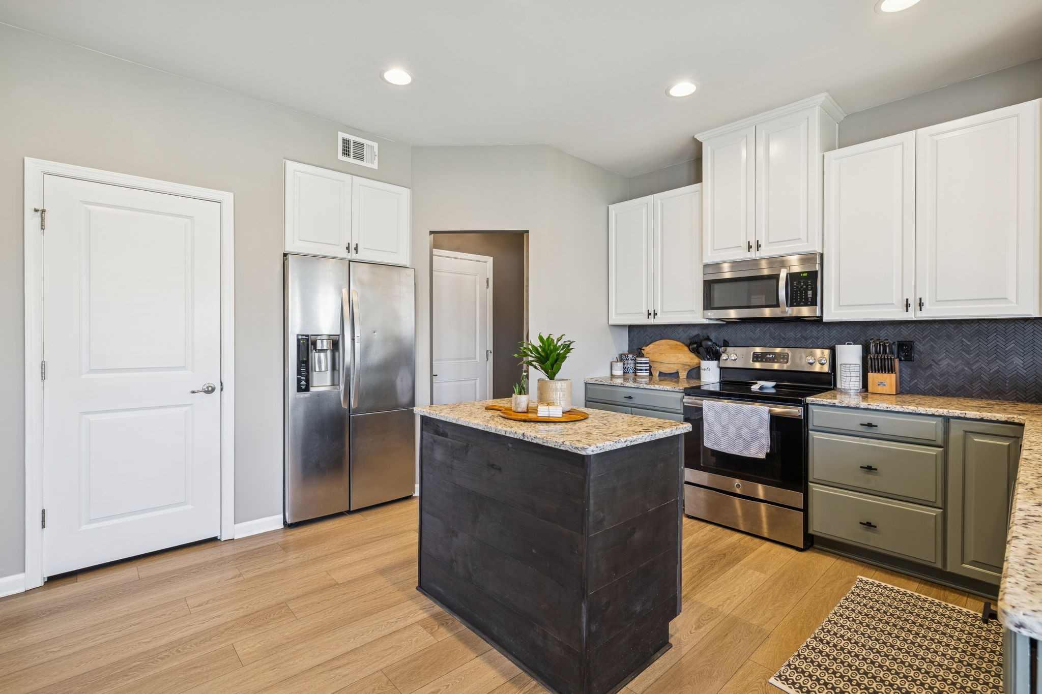 140 Hackney Lane Gallatin, TN 37066 - Photo 36 of 66 a kitchen with stainless steel appliances granite countertop a refrigerator stove and a sink