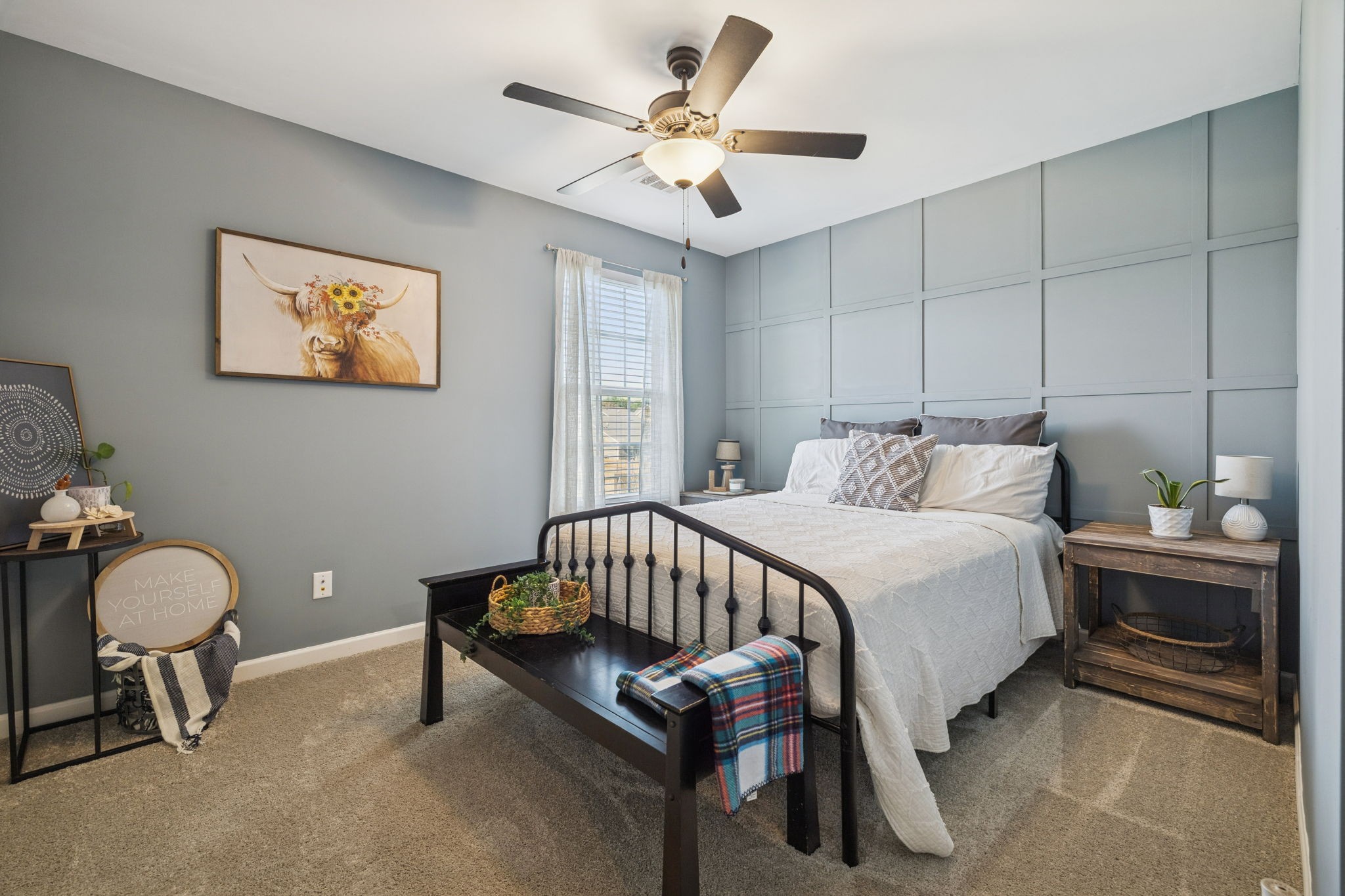 140 Hackney Lane Gallatin, TN 37066 - Photo 38 of 66 a bedroom with a bed and a chandelier