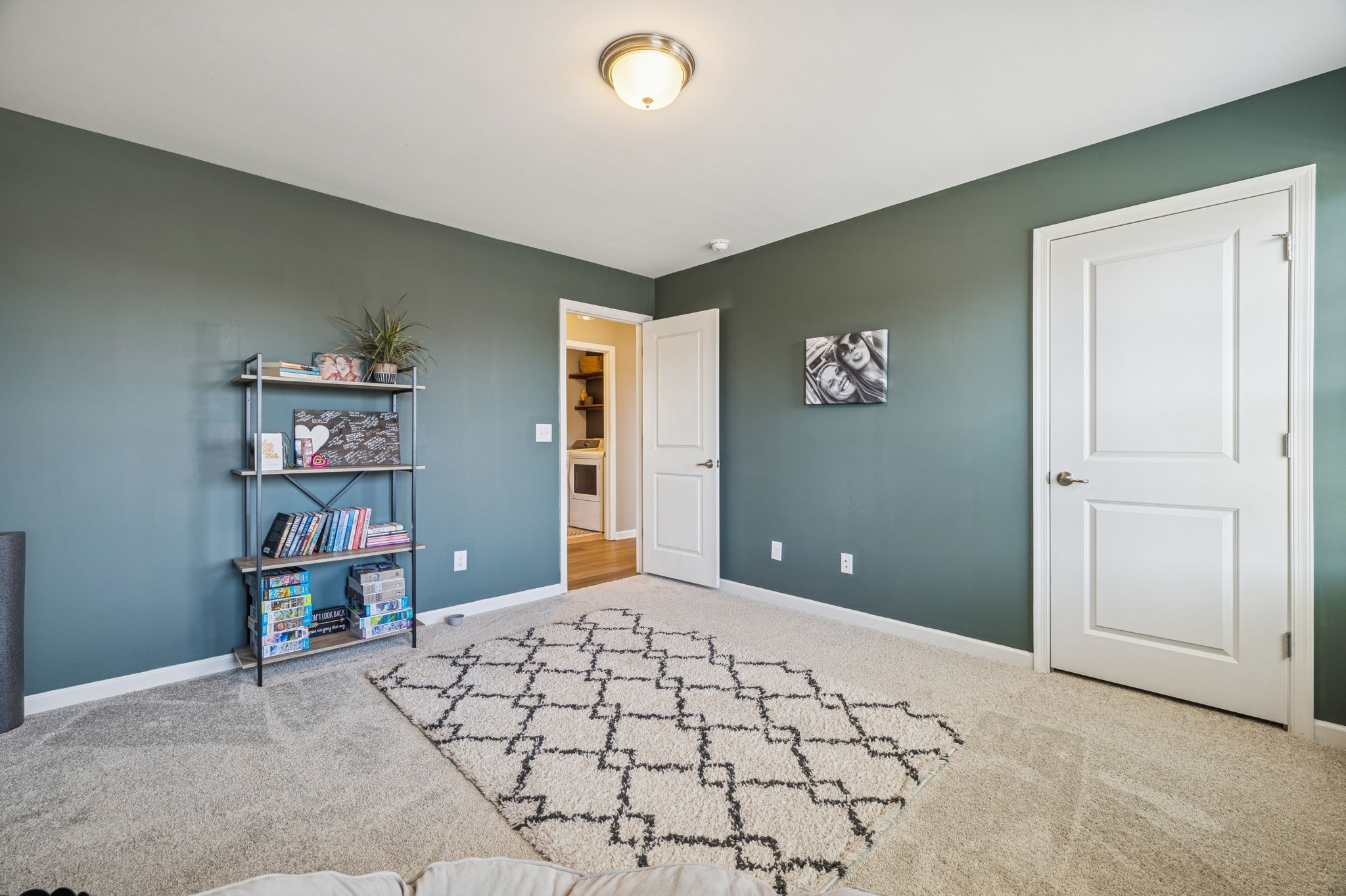 140 Hackney Lane Gallatin, TN 37066 - Photo 47 of 66 a bedroom with a large bed and painting on the wall