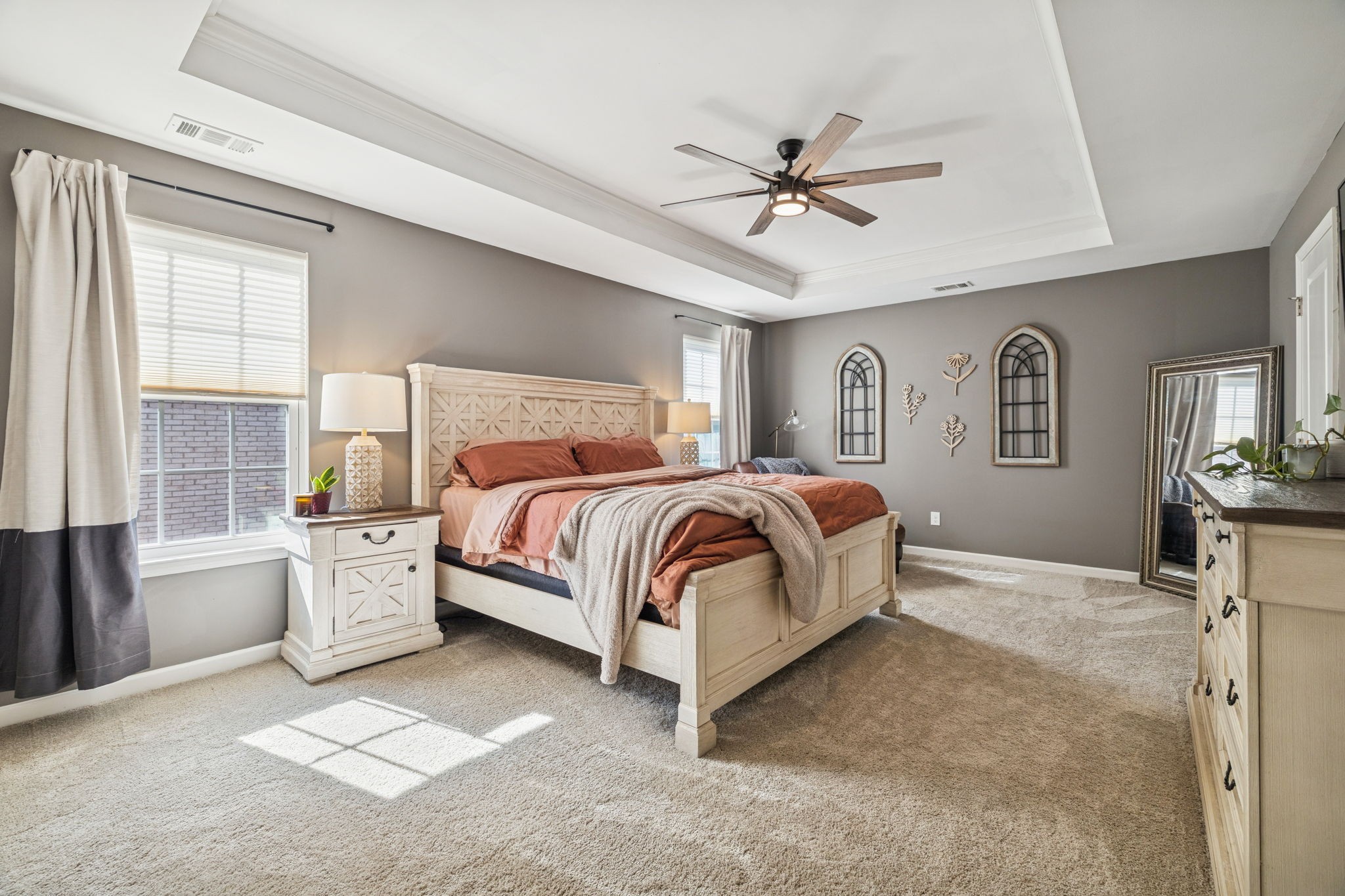 140 Hackney Lane Gallatin, TN 37066 - Photo 50 of 66 a spacious bedroom with a large bed and a chandelier